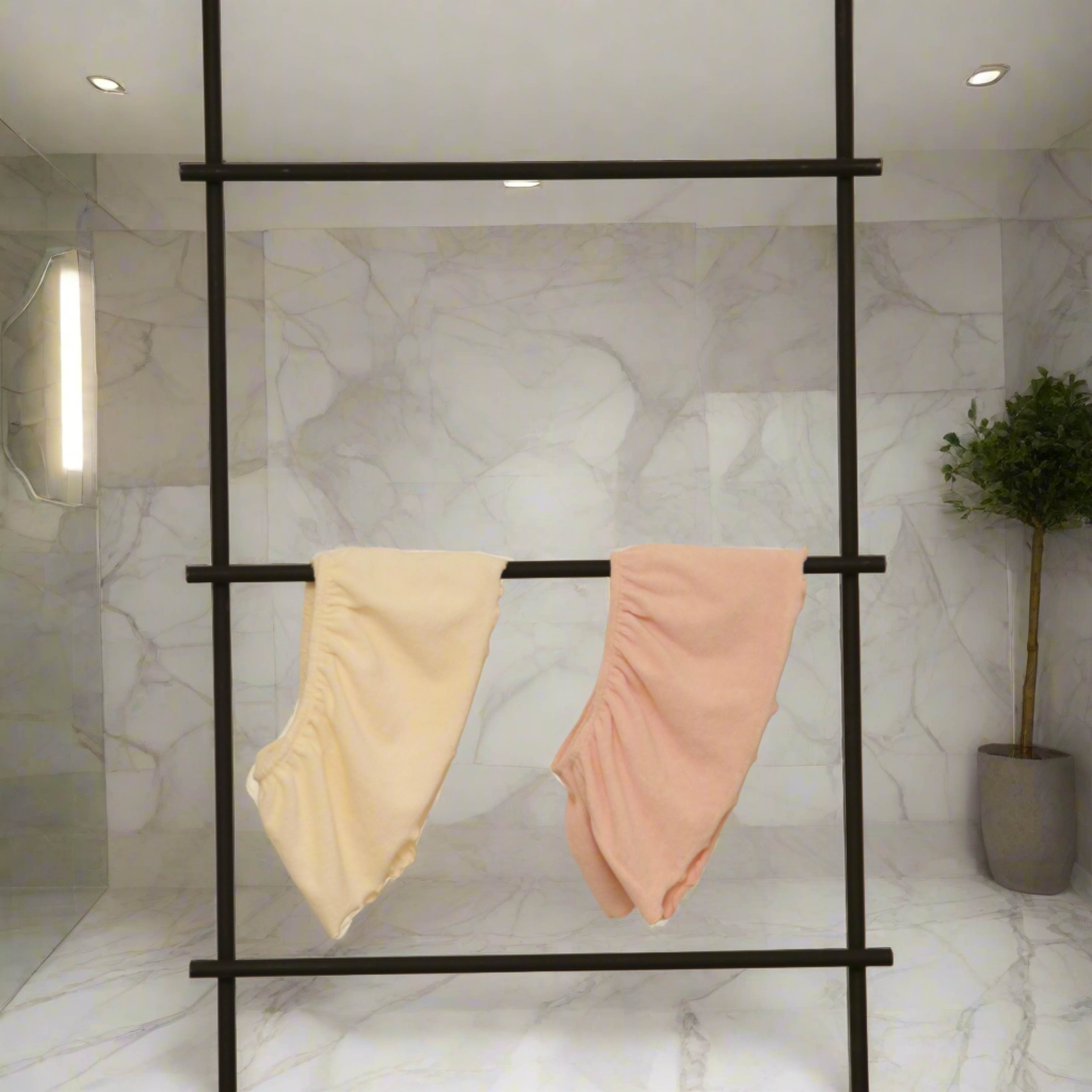 Multi-style arm & bust cover – lightweight, soft towelling & wearable four ways for maternity, beach, spa, or post-shower comfort.