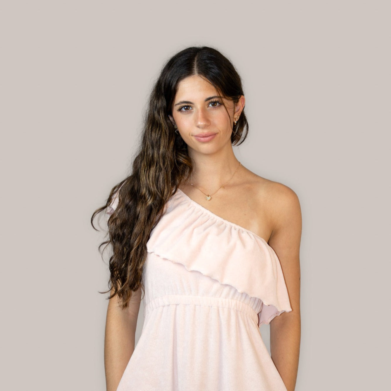 Multi-style arm & bust cover – lightweight, soft towelling & wearable four ways for maternity, beach, spa, or post-shower comfort.