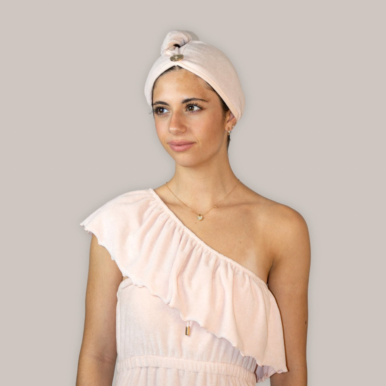 Multi-style arm & bust cover – lightweight, soft towelling & wearable four ways for maternity, beach, spa, or post-shower comfort.