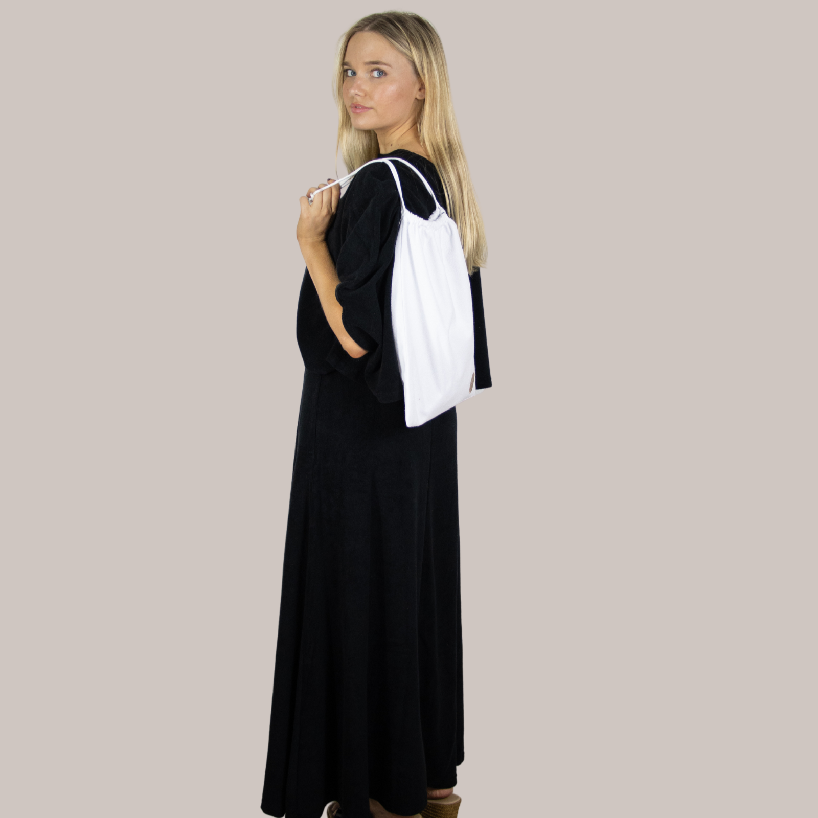 Waterproof drawstring carry bag – stylish, reusable & perfect for wet swimwear, gifting, travel, or beach essentials. with long poncho and long towel dress