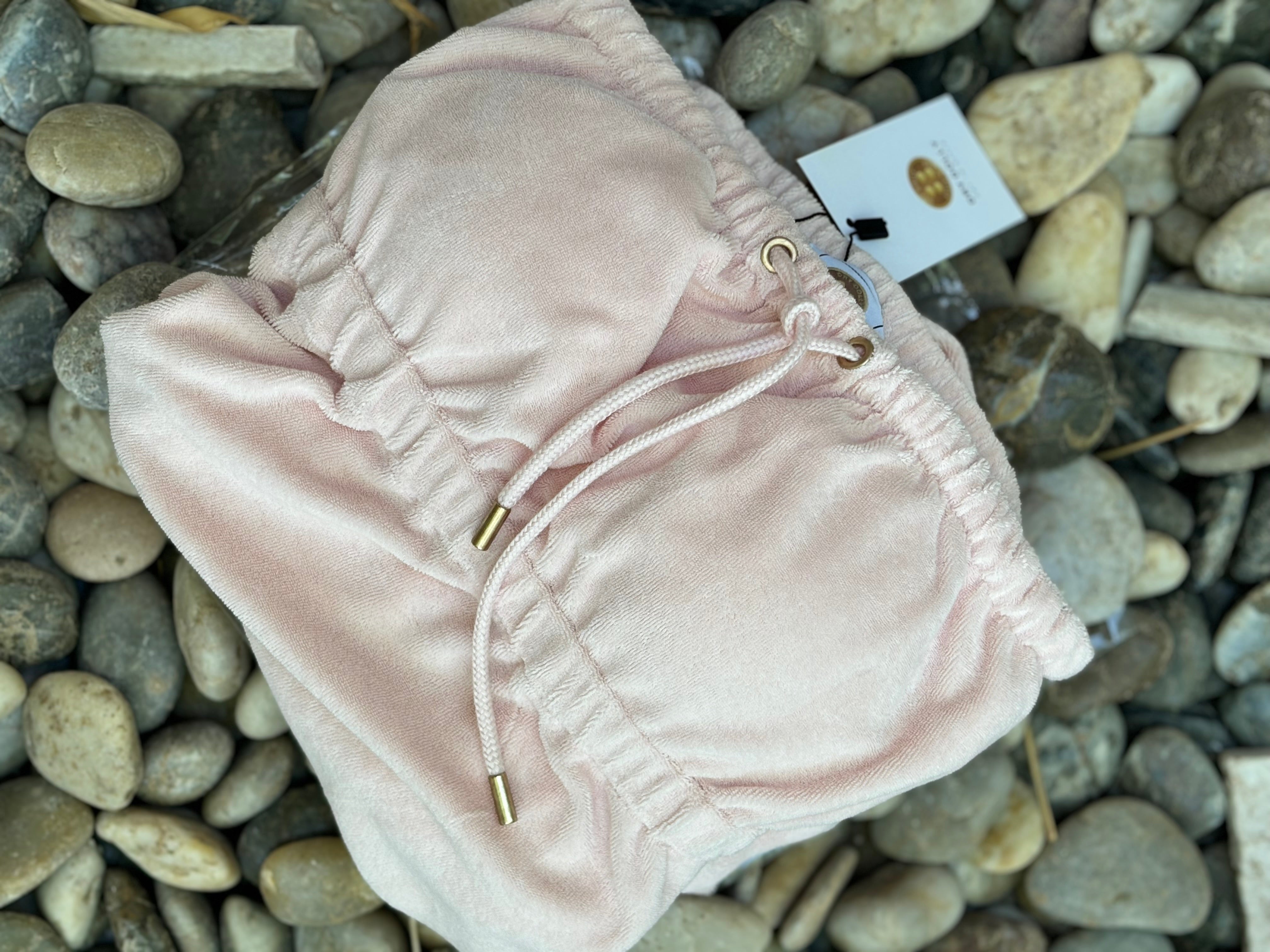 Pink-Dry-Dress-Towel-Dress-Soft-Luxury-Dry-Dolly-On-Pebble-Beach