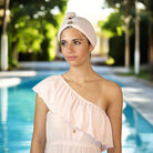 Quick-dry anti-frizz head towel – lightweight, elegant & finished with a gold button for an elevated look